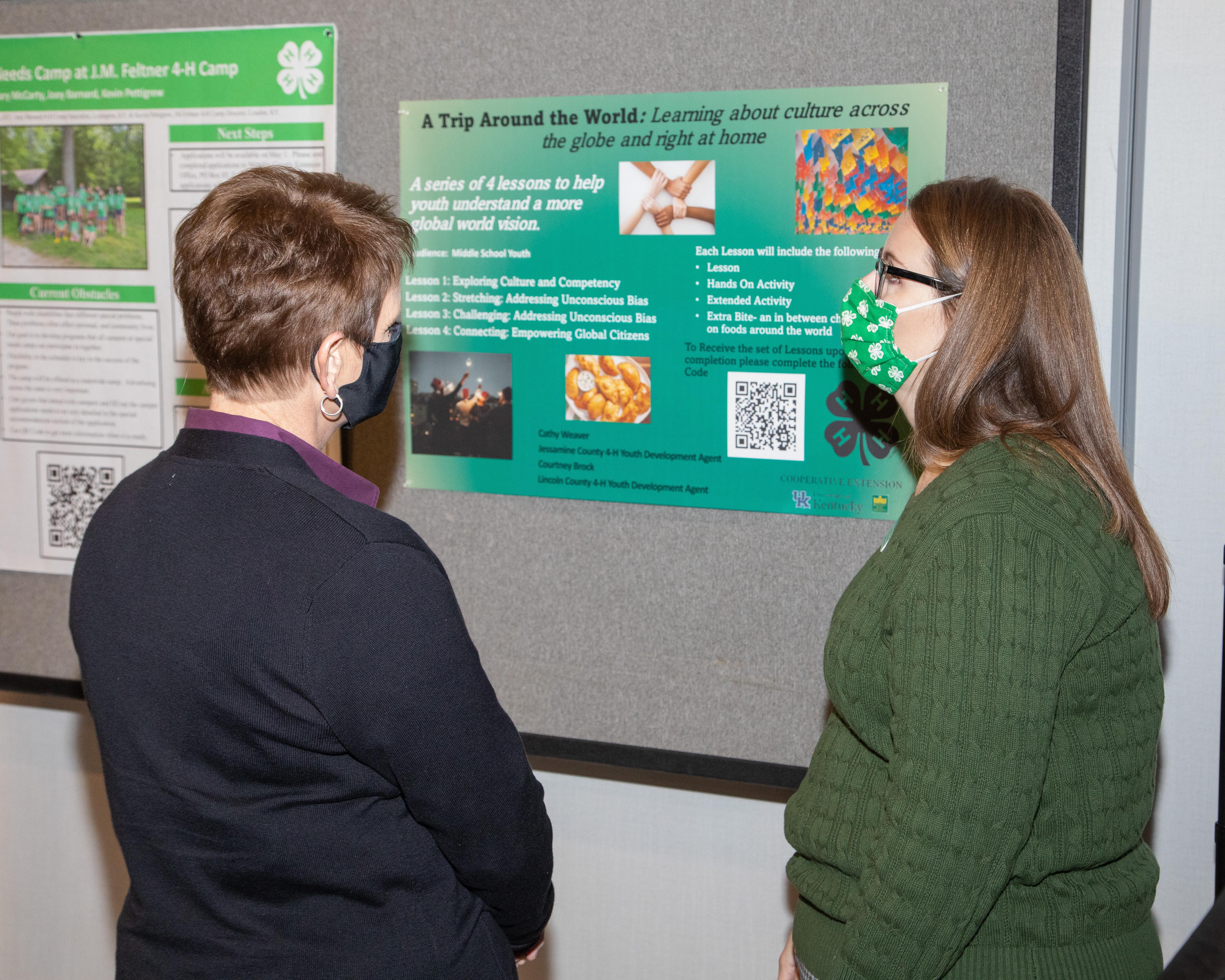 Individual presenting a poster